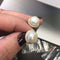 Gold Earrings With Center Pearl And Cz Halo Itsallagift